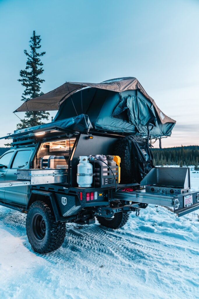 SUMMIT EXPEDITION TRUCKS TOYOTA TACOMA KRAVE AUTOMOTIVE DOUBLE CAB SHORT BOX BED EXPEDITION 60 THREE QUARTER CANOPY FLATBED TRUCK 5